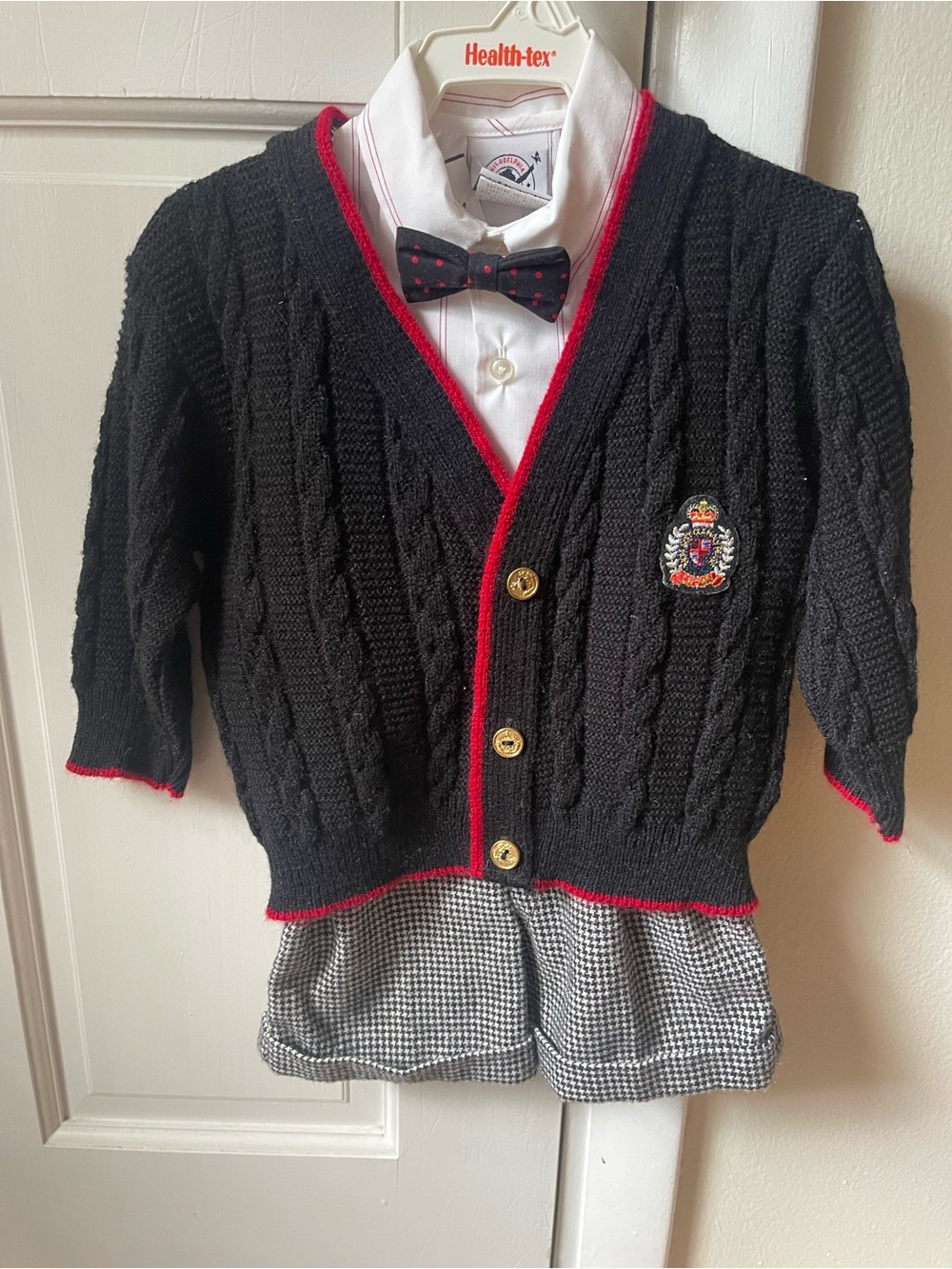 Black Cable-Knit Cardigan Set with Red Trim and Crest